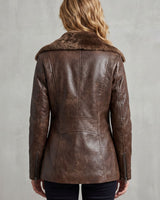 Side view of a tailored faux leather jacket with flush side pockets