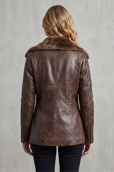 Side view of a tailored faux leather jacket with flush side pockets