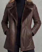 Woman wearing a faux leather jacket with an oversized shearling lapel collar and full-length zip