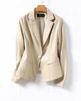 Close-up of the side welt pocket on the leather blazer