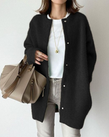 Side profile showing the longline silhouette and hem length