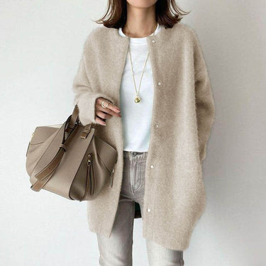 Flat lay of the longline cardigan showing the full front detail