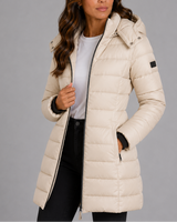 Rear view of longline hooded puffer coat showing quilted panel detail