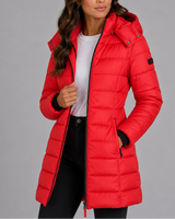 Model wearing longline puffer coat in an outdoor setting