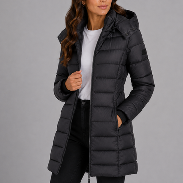 Flat lay of longline hooded puffer coat showing overall quilted structure