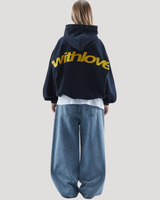 Side view showing dropped shoulder and relaxed silhouette of hoodie