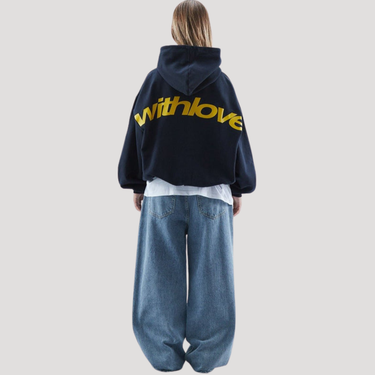 Side view showing dropped shoulder and relaxed silhouette of hoodie