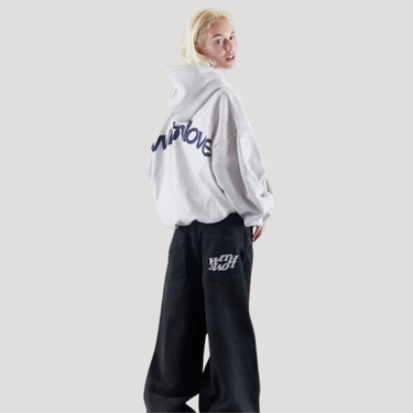Close-up of drawstring hood on graphic oversized hoodie