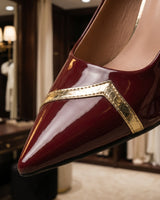 Close-up of the V-shaped metallic trim accent on the toe area
