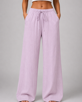 Rear view of wide leg trousers showing relaxed fit