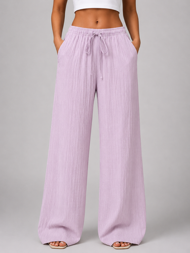 Rear view of wide leg trousers showing relaxed fit
