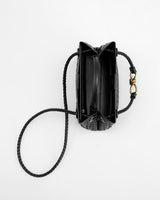 Top-down view of the compact woven bag with single top handle