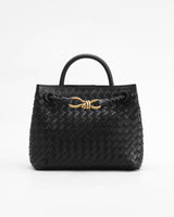 Structured woven top-handle bag with a metallic twist detail at the centre front