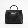 Structured woven top-handle bag with a metallic twist detail at the centre front