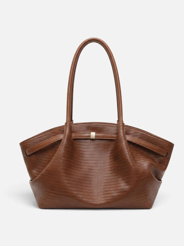 Top-down view of the fully lined interior of the woven tote bag