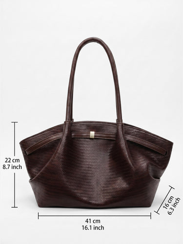 The tote bag placed upright showing its structured shape and stable base