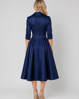 Close-up of the wrap-front bodice showing the V-neckline and lapel collar detail