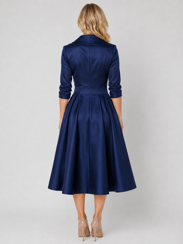 Close-up of the wrap-front bodice showing the V-neckline and lapel collar detail
