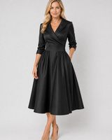 Rear view of the wrap midi dress showing the fitted waist and flowing skirt