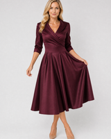Detail shot of the satin-feel woven fabric and skirt pleating