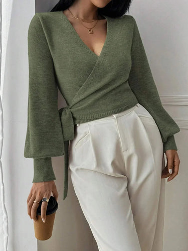 Detail shot of the V-neckline formed by the wrap-front panels