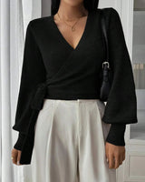Front view of the wrap sweater in brown
