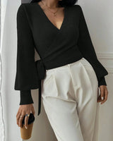 Front view of the wrap sweater in green