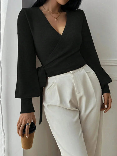 Front view of the wrap sweater in green
