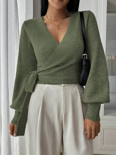 Close-up of the knitted fabric texture on the wrap sweater