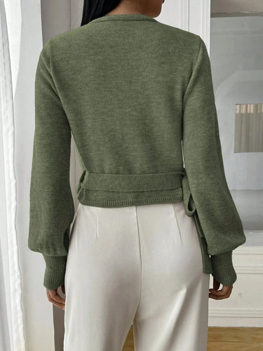 Three-quarter view of the wrap sweater showing sleeve length