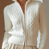 Cable knit zip-up cardigan with stand collar and ribbed cuffs, front view